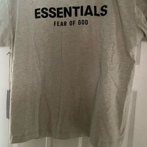 I am selling  an oversized essential tee is it a large it fits oversized